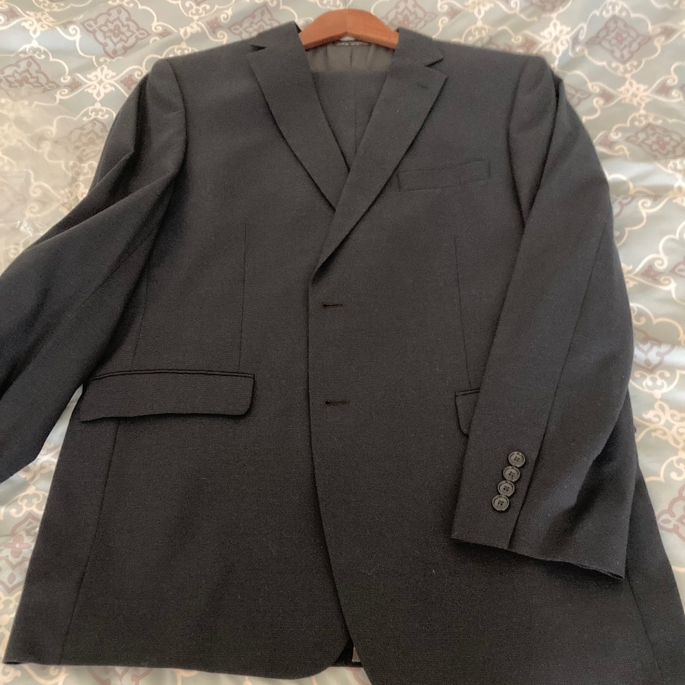 Two piece suit by Jones New York City 100% wool unhemmed